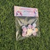 Diseño de unicornio en tonos pastel suaves para bolsa de pastillitas.