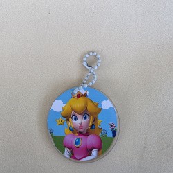 Diseño de Princesa Peach en tonos pastel suaves para llavero colgante.
