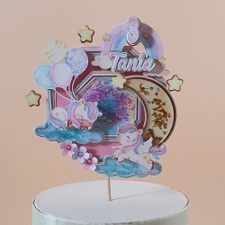 Diseño de unicornio en tonos pastel suaves con purpurina en movimiento.