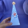 Envase de chuches con ilustración exclusiva del gato cósmico y sus inventos.