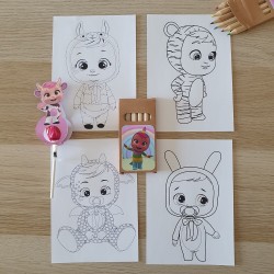 Detalle de papelería y dulce con diseño de muñecas con pijama de animales.