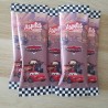 Detalle de aperitivo de maíz infantil para fiestas con diseño de Cars Radiador Springs.