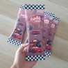 Envoltorio artesanal para Aspitos con temática de Rayo McQueen y Mate.